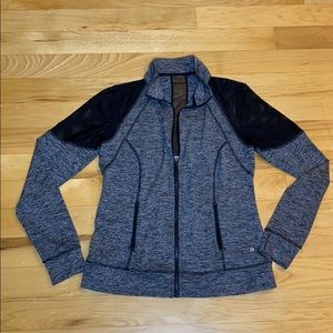 Zip up jacket with mesh shoulders